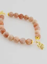 Armband aus Sonnenstein 8mm – Engel und Kreuz