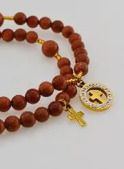 Rosenkranz Armband aus Sonnenstein – Medaille mit Kreuz und Zirkonia
