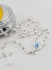 Rosenkranz und Dose Madonna von Guadalupe